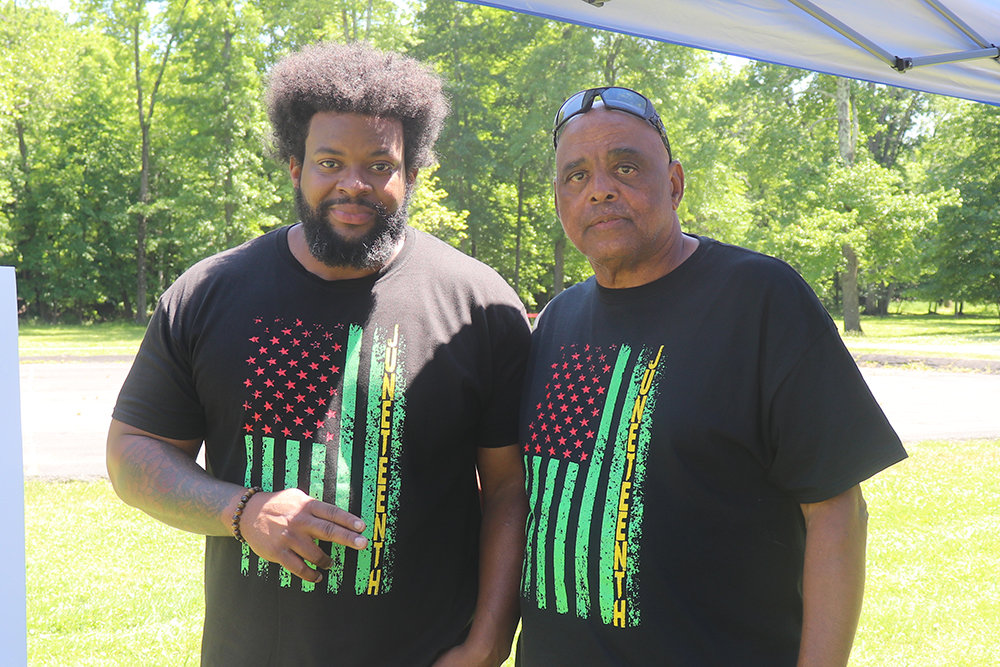 Kyle Conway (l.) and  Ray Harvey  of the Newburgh-Highland Falls Chapter of the NAACP were happy with the turnout at Wooster Grove.